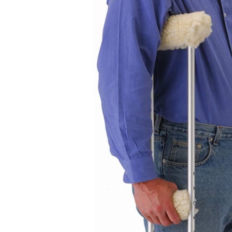 Image of the Nova Crutch Cover Set with man using crutch.