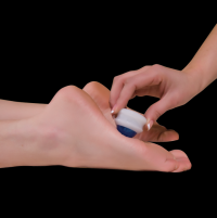 Image of the Core Products Omni Mini Roller massaging a foot. thumbnail