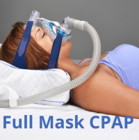 Image of a woman with a full face CPAP mask using the CPAPMax Pillow 2.0. thumbnail