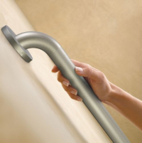 Image of the Peened Grab Bar on the wall with hand using it. thumbnail