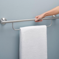 Image of person holding onto multi-purpose grab bar with towel holder. thumbnail